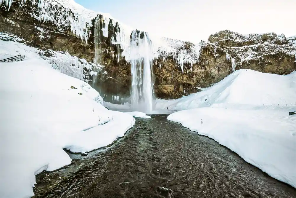Waterfall in winter with snow and ice formations